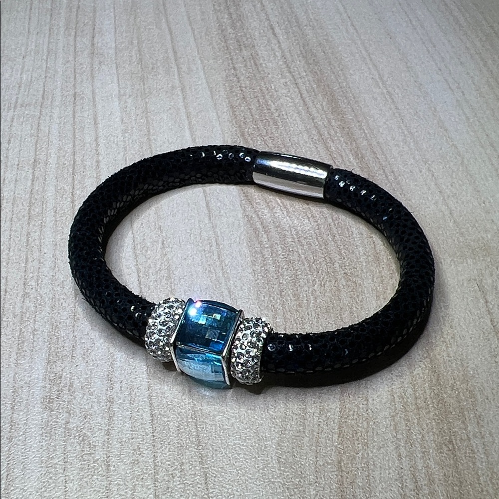 Elegant Black and Silver Woodstock Bracelet with Blue Crystal